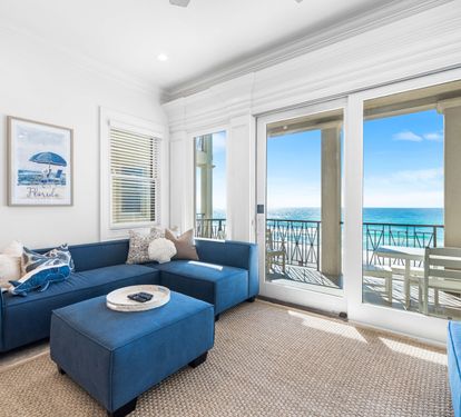 Second Floor Living area with Two Sectional Sofa's Offering a Better Seating Space. A Large Smart TV to Catch all the Favorite's