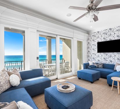 Second Floor Living area with Two Sectional Sofa's Offering a Better Seating Space. A Large Smart TV to Catch all the Favorite's