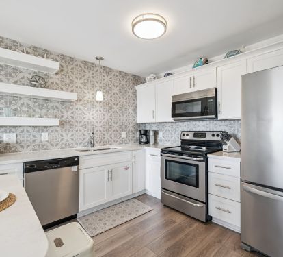 Fully Equipped Kitchen with Stainless Steel Appliances