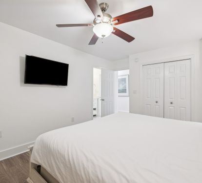 Primary King Suite - Equipped with a Flat-Screen TV