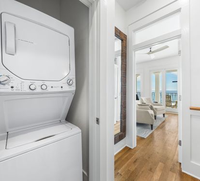 Washer and Dryer Located on the Third Floor Hallway.