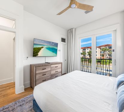 Second Floor King ensuite Bedroom (North Side)with a 55" Smart TV.