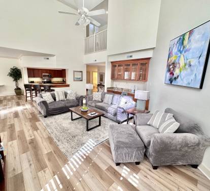 Open floor layout with cathedral ceilings