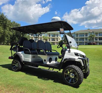 6-Seat Golf Cart Included