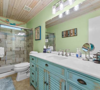 Large shower, facial mirror, and hair dryer 