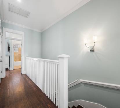 Stairs leading down to the Second Floor Living and Dining Area and Guest King Bedroom and Bath.