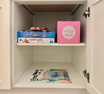 Living Room Entertainment Center Games / Books