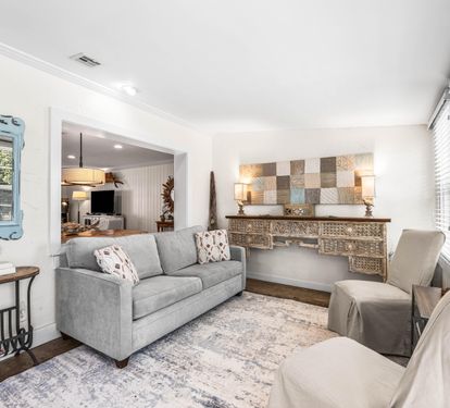 A traditional Florida Room in Seabreeze with a sleeper sofa, bar cabinet, a desk, & access to the pool area through French doors. (safety alarm)
Fully stocked Beach Gear closet