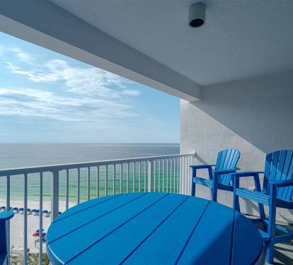 Sip your morning coffee at your private oceanfront table, watching waves roll in from your covered balcony sanctuary.
