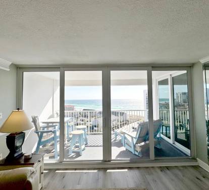 Step into your serene retreat where floor-to-ceiling windows frame breathtaking ocean views, creating the perfect backdrop for morning coffee or evening relaxation.