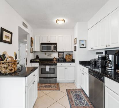 Your fully-equipped kitchen awaits with stainless steel appliances, granite countertops, and everything you need to create memorable meals during your stay.