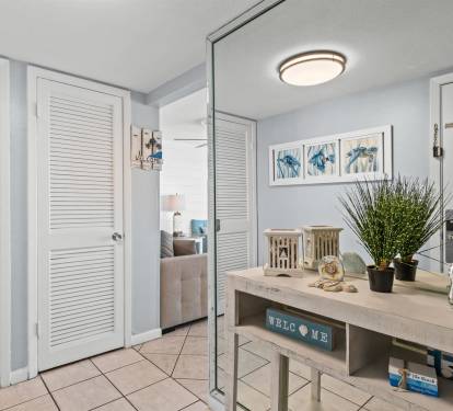 You'll love the bright, welcoming entryway with coastal touches and thoughtful decor that sets a relaxing tone for your stay.