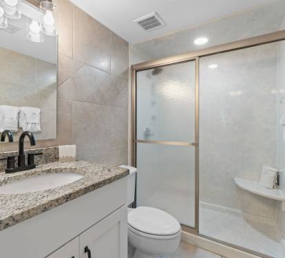 Refresh in your private spa-like bathroom with granite countertops, rainfall shower, and plush towels waiting for you.