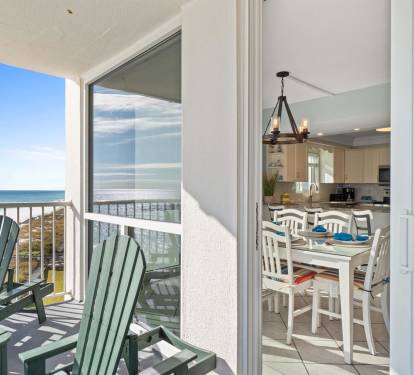 Unwind in your coastal retreat where the open kitchen flows seamlessly onto your private balcony with stunning ocean views.