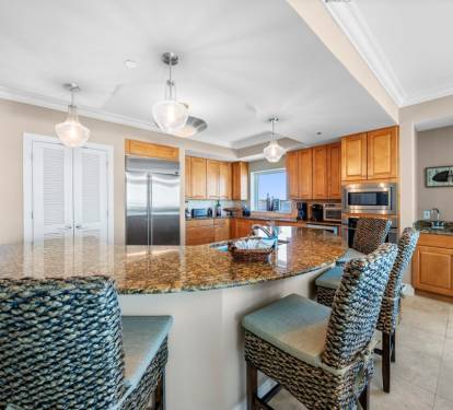 Gather around your spacious granite island where cooking becomes a shared experience, with premium appliances and coastal charm throughout.