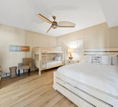 Sleep peacefully in your bright, airy bedroom with comfortable beds and modern amenities like a ceiling fan to keep you cool.