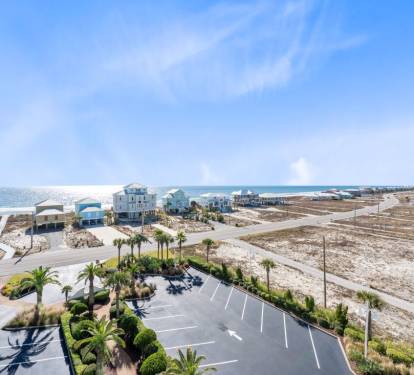 Stunning coastal community with pristine beaches and residential homes nestled between the Gulf and natural dunes.