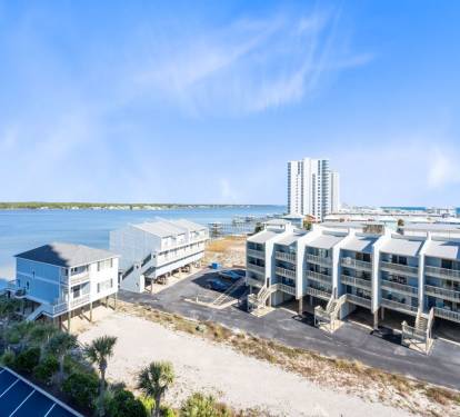 Stunning beachfront location with crystal clear waters and modern coastal architecture perfectly positioned for your waterfront getaway.