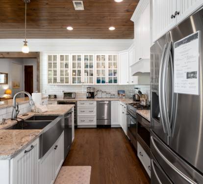 Your fully-equipped gourmet kitchen awaits with granite counters, stainless appliances, and everything you need to create memorable meals together.