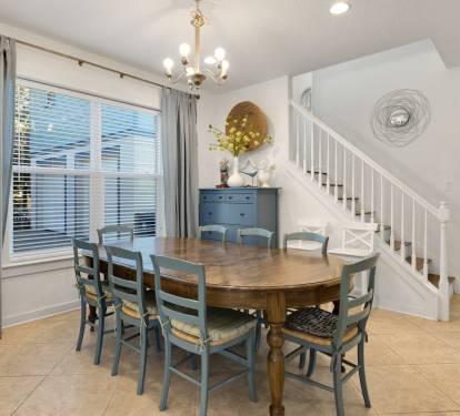Gather around your spacious dining table for memorable meals with family and friends in this bright, welcoming space.