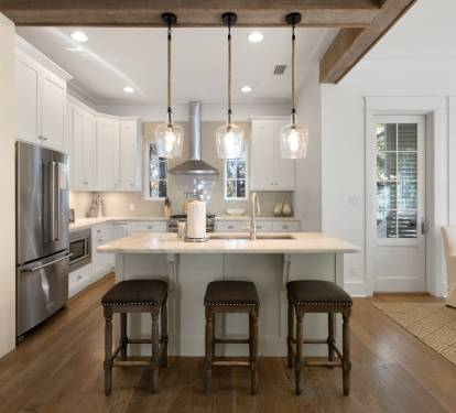 Your gourmet kitchen awaits with marble countertops, professional appliances, and a spacious island perfect for morning coffee or evening meals.