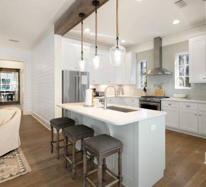 Your chef-worthy kitchen awaits with sleek countertops, modern appliances, and a perfect island for morning coffee or evening conversations.