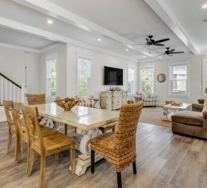 Unwind in this stunning open-concept space where exposed beams meet coastal charm, perfect for your group gatherings.