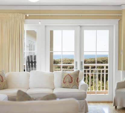 Relax in your bright living space with stunning ocean views through French doors opening to your private balcony.