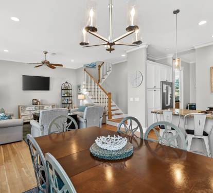Relax in your open-concept haven where modern elegance meets coastal charm—perfect for gathering with loved ones.
