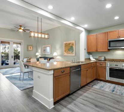 Your open-plan kitchen flows seamlessly into the living area, creating the perfect space for cooking and entertaining together.