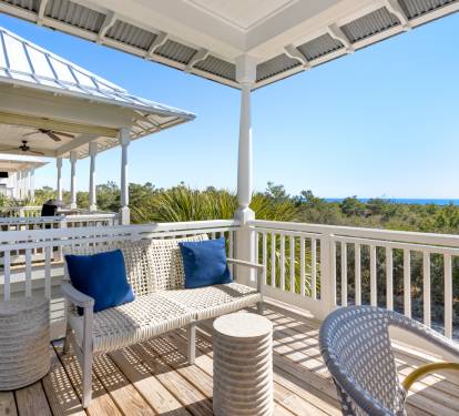 Relax on your private balcony with gulf views, where comfortable seating and coastal breezes create the perfect spot to unwind.