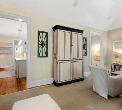 Your spacious living area flows seamlessly into the modern kitchen, creating the perfect open space for relaxing and entertaining.