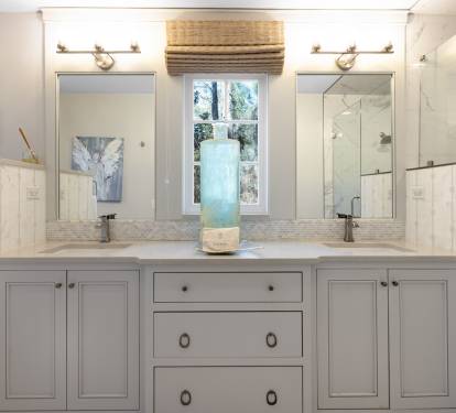 Refresh in your elegant marble bathroom with dual vanities, rainfall shower, and spa-like serenity.