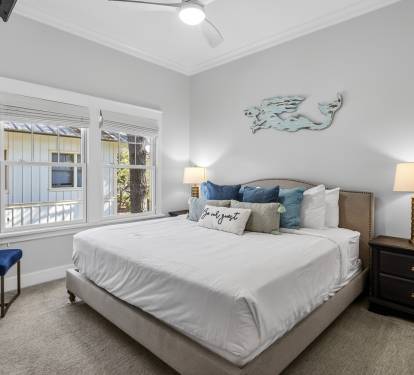 Sink into plush comfort in your serene bedroom retreat, where coastal touches and soft linens create the perfect sanctuary for restful nights.