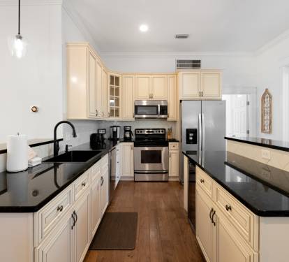 Your spacious gourmet kitchen features granite countertops, stainless steel appliances, and ample cabinet storage for creating memorable vacation meals.