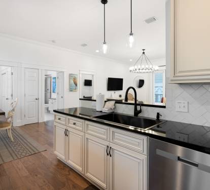 Your gourmet kitchen features elegant granite counters, custom cabinetry, and premium appliances for memorable meal prep.