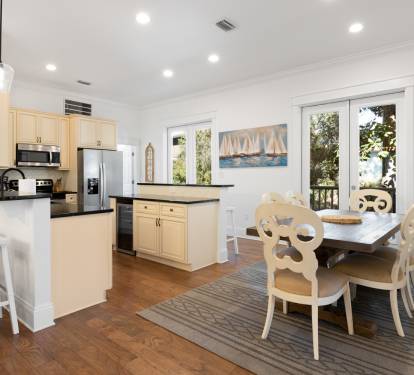 Your spacious open kitchen flows seamlessly into the dining area, where you'll love preparing meals and gathering around the elegant table.