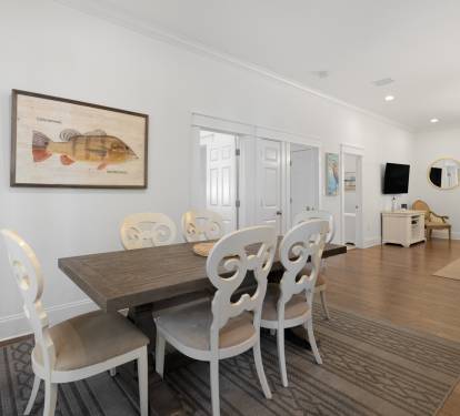 Gather around your elegant dining table for memorable meals with coastal charm and sophisticated comfort.