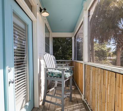 Relax in your private screened balcony with tropical views and coastal breezes flowing through.