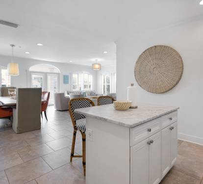 Unwind in your bright, open-concept space where natural light floods through stunning windows, creating the perfect backdrop for memorable meals.