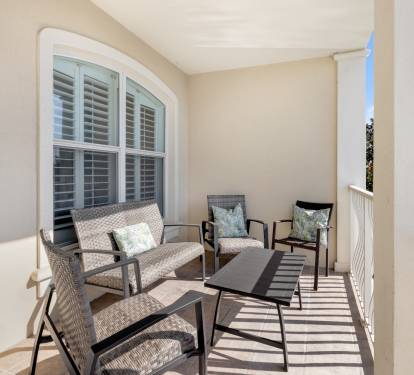 Your private covered terrace offers comfortable seating where you can unwind with morning coffee or evening conversations in peaceful seclusion.