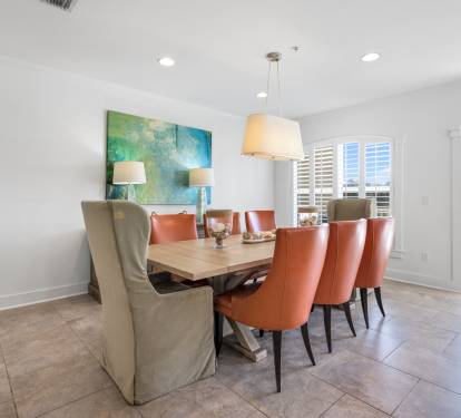 Gather around your elegant dining table for memorable meals together. Stylish chairs and warm lighting create the perfect atmosphere for every occasion.