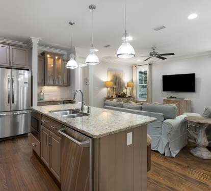 Your open-concept kitchen and living space seamlessly blends modern comfort with elegant design for memorable gatherings.