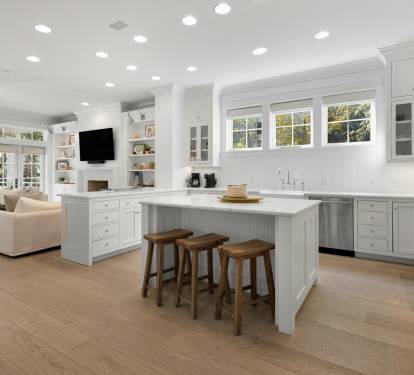 Your bright, open-plan kitchen flows seamlessly into the living area, creating perfect spaces for cooking, dining, and relaxing together.