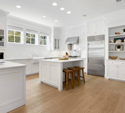 Cook together in this bright, spacious kitchen with premium appliances and a welcoming island perfect for morning coffee or evening meals.