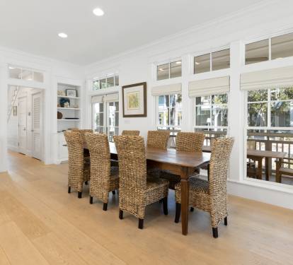 Gather around this beautiful dining table where memorable meals and conversations await in your bright, airy retreat.