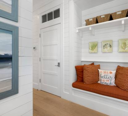 Curl up in your cozy built-in nook with beach views, perfect for reading or watching waves roll in.