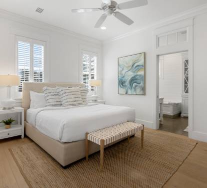 Your peaceful bedroom sanctuary features crisp linens, coastal artwork, and a private ensuite for ultimate comfort.