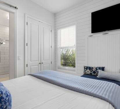 Your cozy bedroom features crisp linens and a window seat where you can relax with morning coffee or evening views.