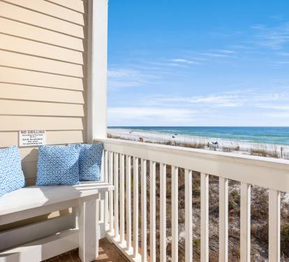 Gulf front balcony offers stunning ocean views and comfortable seating for your perfect coastal getaway.